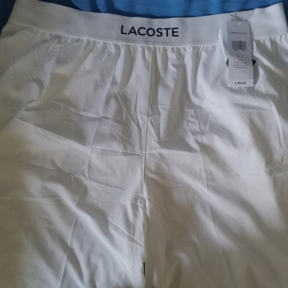 White lacost shorts